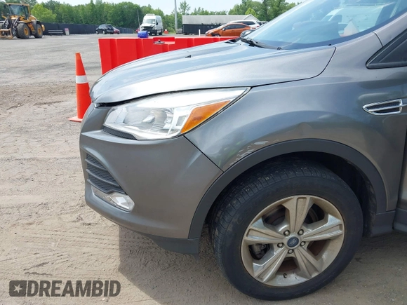 2013 Ford Escape SE z VIN 1FMCU0G9XDUB65263, wystawiony jako IAAI lot #42465579 z przebiegiem 196 751 mil mil oraz . Historia ofert i sprzedaży dostępna na DreamBid. Obrazek 6.