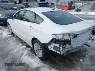 2014 Ford Fusion SE Hybrid with VIN 3FA6P0LU7ER395795, listed as a IAAI auction lot 41515505 with 58,037 mi miles. Bid and sale history available at carsss.com. Image 3.