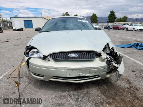 2006 Ford Taurus SE с VIN 1FAFP53U36A203006, выставлен на аукционе Copart как лот 63012895 с пробегом Не указан миль и Списание • Salvage title. История ставок и продаж доступна на DreamBid. Изображение 5.