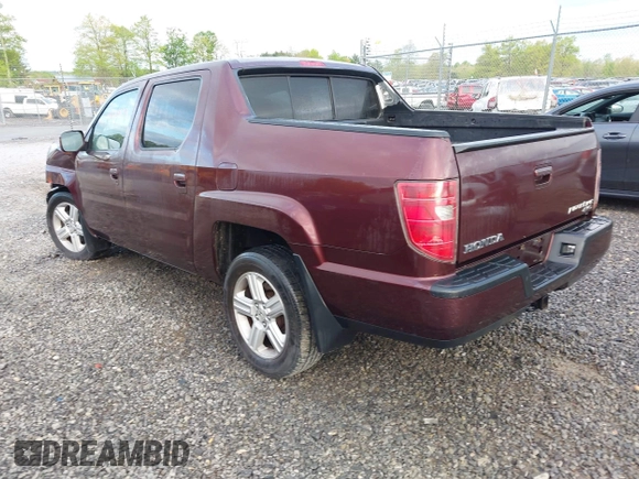 2010 Honda Ridgeline RTL with VIN 5FPYK1F57AB005602, listed as a IAAI auction lot 42208633 with 106,777 mi miles and . Bid and sale history available at DreamBid. Image 3.