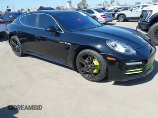 2014 Porsche Panamera S E-Hybrid with VIN WP0AD2A79EL044648, listed as a IAAI auction lot 42312153 with 90,602 mi miles and . Bid and sale history available at DreamBid. Image 1.