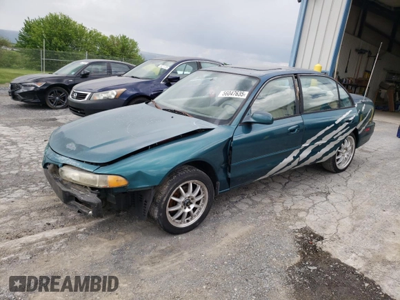 1997 Mitsubishi Galant ES z VIN 4A3AJ56G5VE019296, wystawiony jako Copart lot #56047635 z przebiegiem 87 533 mil mil oraz Szkoda całkowita • Salvage title. Historia ofert i sprzedaży dostępna na DreamBid. Obrazek 1.