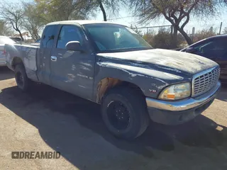 1997 Dodge Dakota z VIN 1B7GL23Y0VS153508, wystawiony jako IAAI lot #41610079 z przebiegiem 266 645 mil mil oraz . Historia ofert i sprzedaży dostępna na DreamBid. Obrazek 1.