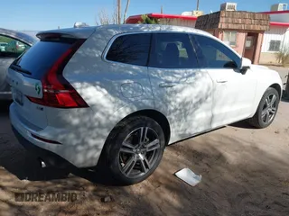 2020 Volvo XC60 Momentum with VIN YV4A22RK6L1553603, listed as a IAAI auction lot 41103991 with 67,509 mi miles and . Bid and sale history available at DreamBid. Image 4.