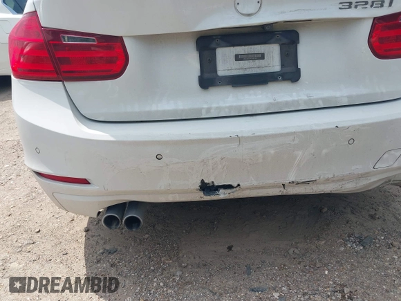 2013 BMW 3 Series 328i with VIN WBA3A5C5XDJ461783, listed as a IAAI auction lot 42150355 with 115,992 mi miles and . Bid and sale history available at DreamBid. Image 6.