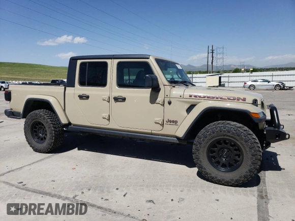2020 Jeep Gladiator Rubicon z VIN 1C6JJTBG2LL190732, wystawiony jako Copart lot #57100115 z przebiegiem 55 679 mil mil oraz Szkoda całkowita • Salvage title. Historia ofert i sprzedaży dostępna na DreamBid. Obrazek 4.