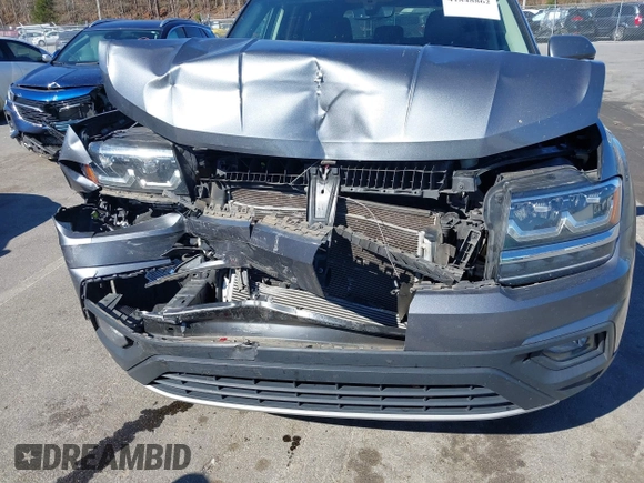 2018 Volkswagen Atlas SE with VIN 1V2CR2CA0JC571988, listed as a IAAI auction lot 41848862 with 96,426 mi miles and . Bid and sale history available at DreamBid. Image 6.