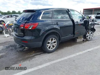 2014 Mazda CX-9 Touring with VIN JM3TB2CA9E0442202, listed as a IAAI auction lot 42292356 with 239,578 mi miles and . Bid and sale history available at DreamBid. Image 4.