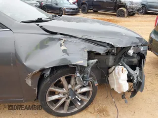 2017 Mazda 3 Touring z VIN JM1BN1V77H1101001, wystawiony jako IAAI lot #41393592 z przebiegiem 77 566 mil mil oraz . Historia ofert i sprzedaży dostępna na DreamBid. Obrazek 6.