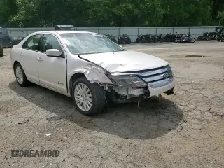 2012 Ford Fusion Hybrid с VIN 3FADP0L35CR184476, выставлен на аукционе Copart как лот 63907885 с пробегом 230 589 миль миль и Списание • Salvage title. История ставок и продаж доступна на DreamBid. Изображение 14.
