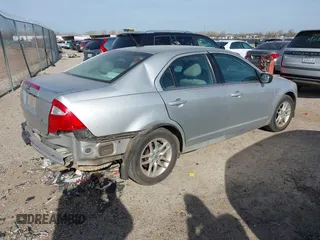 2012 Ford Fusion S with VIN 3FAHP0GA2CR143572, listed as a IAAI auction lot 41826526 with 199,083 mi miles. Bid and sale history available at carsss.com. Image 4.