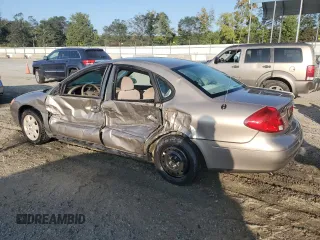 2003 Ford Taurus z VIN 1FAFP52253A170456, wystawiony jako Copart lot #70009824 z przebiegiem 216 567 mil mil oraz Szkoda całkowita • Salvage title. Historia ofert i sprzedaży dostępna na DreamBid. Obrazek 2.