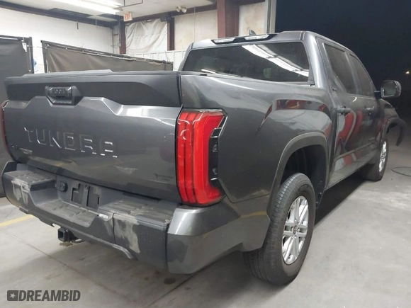 2024 Toyota Tundra 4WD SR5 with VIN 5TFLA5DB6RX209041, listed as a IAAI auction lot 40935127 with 9,735 mi miles. Bid and sale history available at carsss.com. Image 4.