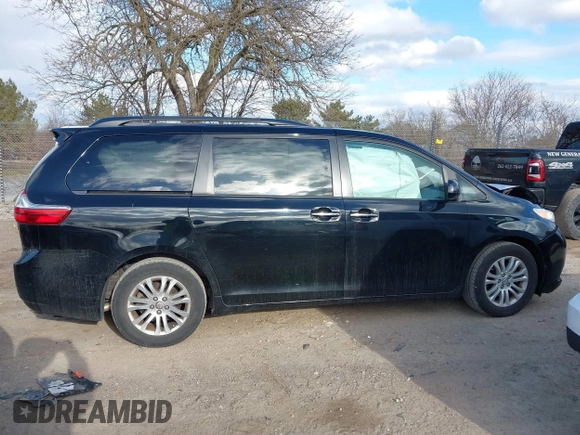 2015 Toyota Sienna XLE with VIN 5TDYK3DC2FS651400, listed as a IAAI auction lot 41985468 with 122,335 mi miles and . Bid and sale history available at DreamBid. Image 13.