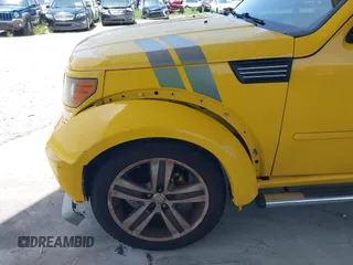 2011 Dodge Nitro z VIN 1D4PU6GX5BW512588, wystawiony jako IAAI lot #42471965 z przebiegiem 115 827 mil mil oraz . Historia ofert i sprzedaży dostępna na DreamBid. Obrazek 12.