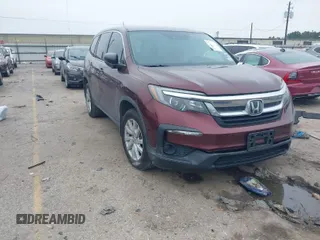 2019 Honda Pilot LX with VIN 5FNYF5H12KB023764, listed as a IAAI auction lot 41589629 with 66,879 mi miles. Bid and sale history available at carsss.com. Image 1.