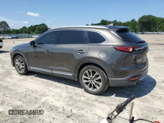 2018 Mazda CX-9 Grand Touring with VIN JM3TCADY1J0212568, listed as a Copart auction lot 60195385 with 151,099 mi miles and Salvage title. Bid and sale history available at DreamBid. Image 2.