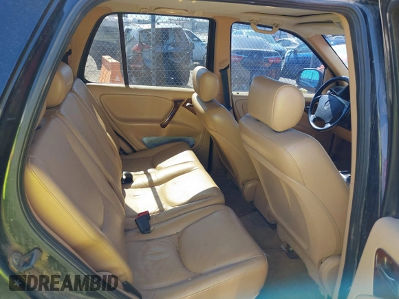 1998 Mercedes-Benz M-Class with VIN 4JGAB54EXWA030493, listed as a IAAI auction lot 41695224 with 249,325 mi miles. Bid and sale history available at carsss.com. Image 8.