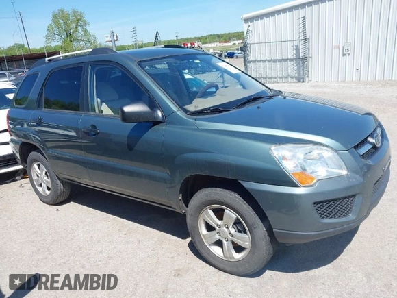 2009 Kia Sportage LX with VIN KNDJF724497602223, listed as a IAAI auction lot 42085415 with 91,105 mi miles. Bid and sale history available at carsss.com. Image 1.