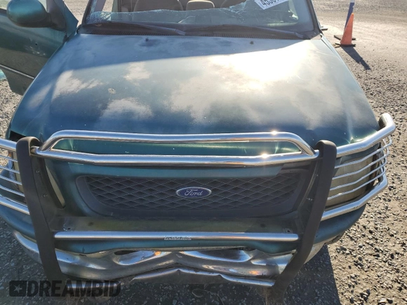 1998 Ford F-150 with VIN 1FTZF18W1WNA35212, listed as a Copart auction lot 45361785 with 227,735 mi miles and Salvage title. Bid and sale history available at DreamBid. Image 13.