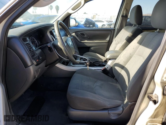 2005 Mazda Tribute i with VIN 4F2YZ02Z85KM31234, listed as a Copart auction lot 68669434 with 211,921 mi miles and Salvage Title. Bid and sale history available at carsss.com. Image 7.