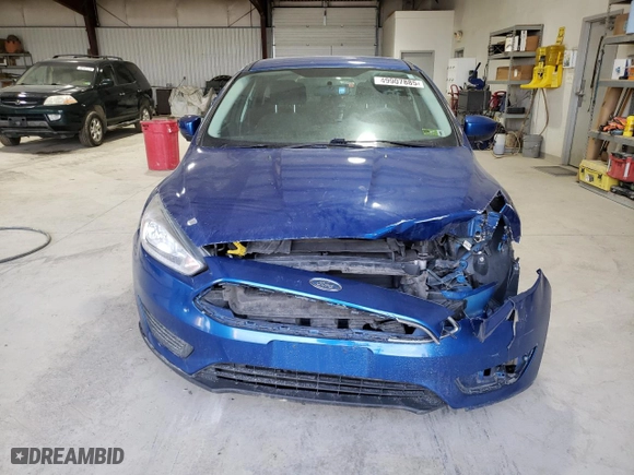 2018 Ford Focus SE with VIN 1FADP3F2XJL218072, listed as a Copart auction lot 49907885 with 122,296 mi miles and Salvage Title. Bid and sale history available at carsss.com. Image 5.