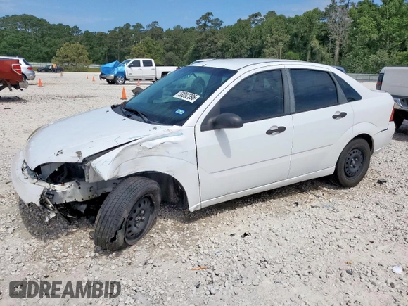 2007 Ford Focus S with VIN 1FAHP34NX7W225626, listed as a Copart auction lot 58202395 with 157,844 mi miles and Salvage title. Bid and sale history available at DreamBid. Image 1.