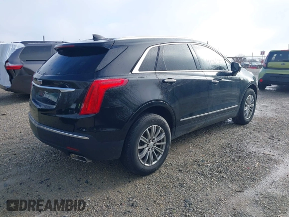 2017 Cadillac XT5 Luxury AWD with VIN 1GYKNDRS8HZ257253, listed as a IAAI auction lot 41968223 with 91,984 mi miles and . Bid and sale history available at carsss.com. Image 4.