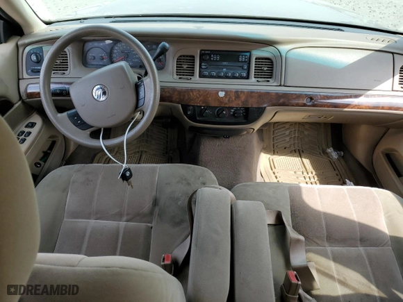 2005 Mercury Grand Marquis GS with VIN 2MEFM74W75X627162, listed as a Copart auction lot 64709124 with 118,697 mi miles and Salvage Title. Bid and sale history available at carsss.com. Image 8.