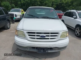 2003 Ford F-150 XL with VIN 1FTRX07263KD53880, listed as a IAAI auction lot 42422353 with 192,630 mi miles and . Bid and sale history available at DreamBid. Image 6.