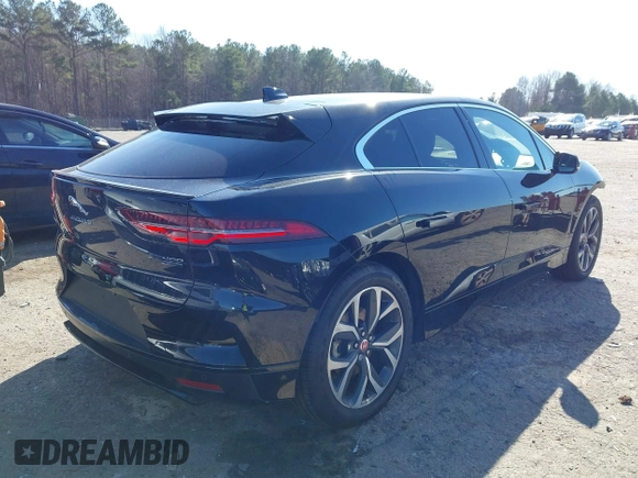 2020 Jaguar I-Pace SE with VIN SADHC2S12L1F87240, listed as a IAAI auction lot 41489254 with 58,359 mi miles and . Bid and sale history available at DreamBid. Image 4.
