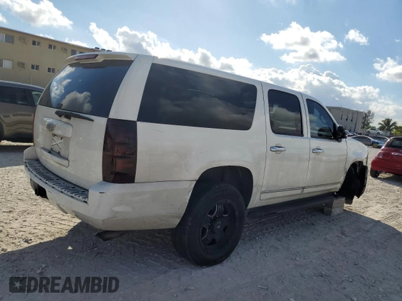 2011 Chevrolet Suburban z VIN 1GNWK5EG0BR121950, wystawiony jako Copart lot #82678394 z przebiegiem 154 952 mil mil oraz Szkoda całkowita • Salvage title. Historia ofert i sprzedaży dostępna na DreamBid. Obrazek 3.