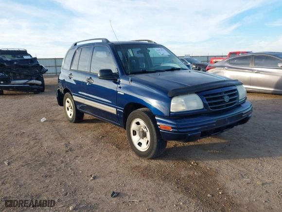 2003 Suzuki Vitara JLS with VIN 2S3TE52V436101091, listed as a IAAI auction lot 41472279 with 163,429 mi miles. Bid and sale history available at carsss.com. Image 1.