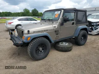 2004 Jeep Wrangler Rubicon z VIN 1J4FA69S24P713388, wystawiony jako Copart lot #61196515 z przebiegiem 155 092 mil mil oraz Czysty tytuł • Clean title. Historia ofert i sprzedaży dostępna na DreamBid. Obrazek 1.