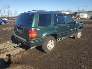 1998 Jeep Grand Cherokee Laredo with VIN 1J4GZ48S4WC239246, listed as a Copart auction lot 86101204 with 0 mi miles and Salvage Title. Bid and sale history available at carsss.com. Image 3.