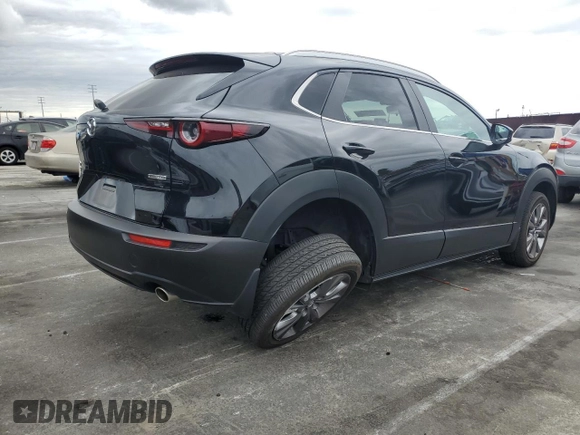 2024 Mazda CX-30 S Carbon Edition z VIN 3MVDMBCM1RM618954, wystawiony jako Copart lot #53690825 z przebiegiem 16 776 mil mil oraz Szkoda całkowita • Salvage title. Historia ofert i sprzedaży dostępna na DreamBid. Obrazek 3.