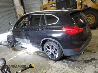 2018 BMW X1 xDrive28i with VIN WBXHT3C35J5K30657, listed as a Copart auction lot 43612815 with 61,181 mi miles and Salvage Title. Bid and sale history available at carsss.com. Image 2.