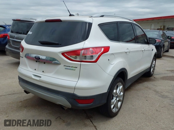 2014 Ford Escape Titanium with VIN 1FMCU0JX7EUB00220, listed as a IAAI auction lot 41945725 with 162,385 mi miles. Bid and sale history available at carsss.com. Image 4.