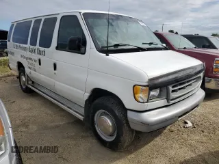 2000 Ford Econoline Passenger XL with VIN 1FBSS31L1YHB80264, listed as a Copart auction lot 74762814 with 61,702 mi miles and Salvage Title. Bid and sale history available at DreamBid. Image 4.