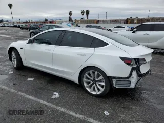 2019 Tesla Model 3 Mid Range z VIN 5YJ3E1EA3KF337854, wystawiony jako Copart lot #48472855 z przebiegiem 113 562 mil mil oraz Szkoda całkowita • Salvage title. Historia ofert i sprzedaży dostępna na DreamBid. Obrazek 2.