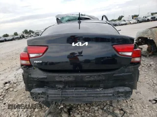 2023 Kia Rio S with VIN 3KPA24AD4PE586940, listed as a Copart auction lot 67748104 with Not Provided miles and Salvage Title. Bid and sale history available at DreamBid. Image 6.