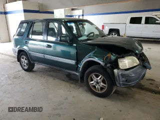 2000 Honda CR-V EX with VIN JHLRD1863YC017642, listed as a Copart auction lot 69393124 with 228,627 mi miles and Salvage Title. Bid and sale history available at carsss.com. Image 4.