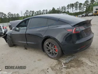 2023 Tesla Model 3 z VIN 5YJ3E1EA7PF668511, wystawiony jako Copart lot #51055725 z przebiegiem 53 594 mil mil oraz Szkoda całkowita • Salvage title. Historia ofert i sprzedaży dostępna na DreamBid. Obrazek 2.