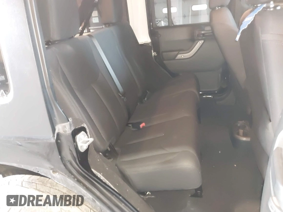 2018 Jeep Wrangler Unlimited Sport S with VIN 1C4HJWDG5JL888349, listed as a IAAI auction lot 40764318 with 61,419 mi miles and . Bid and sale history available at DreamBid. Image 8.