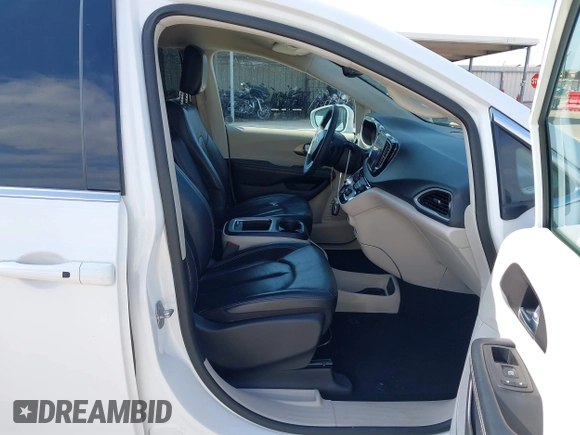 2022 Chrysler Pacifica Touring L with VIN 2C4RC1BG8NR197706, listed as a IAAI auction lot 42414290 with 56,972 mi miles and . Bid and sale history available at DreamBid. Image 5.