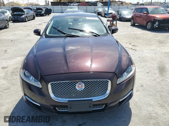 2014 Jaguar XJ with VIN SAJWA1CZ3E8V69877, listed as a Copart auction lot 51520405 with 57,567 mi miles and Clean Title. Bid and sale history available at DreamBid. Image 5.
