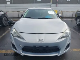 2013 Scion FR-S with VIN JF1ZNAA1XD1729862, listed as a IAAI auction lot 41143862 with 64,208 mi miles. Bid and sale history available at carsss.com. Image 12.