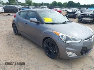 2016 Hyundai Veloster with VIN KMHTC6AD0GU250801, listed as a IAAI auction lot 42415732 with 71,716 mi miles and . Bid and sale history available at DreamBid. Image 1.