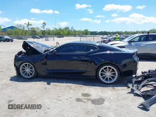 2018 Chevrolet Camaro 1LT z VIN 1G1FB1RX8J0184852, wystawiony jako IAAI lot #42268638 z przebiegiem 99 610 mil mil oraz . Historia ofert i sprzedaży dostępna na DreamBid. Obrazek 15.