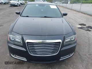 2013 Chrysler 300 with VIN 2C3CCABT2DH735764, listed as a IAAI auction lot 41977616 with 164,517 mi miles. Bid and sale history available at carsss.com. Image 12.